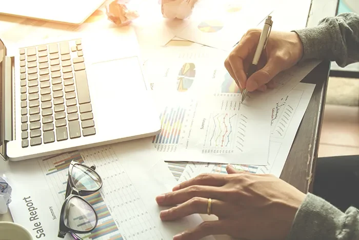 financial documents and calculator